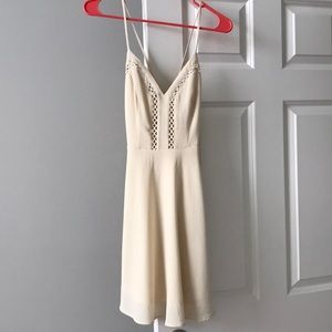 Cream dress with detailing